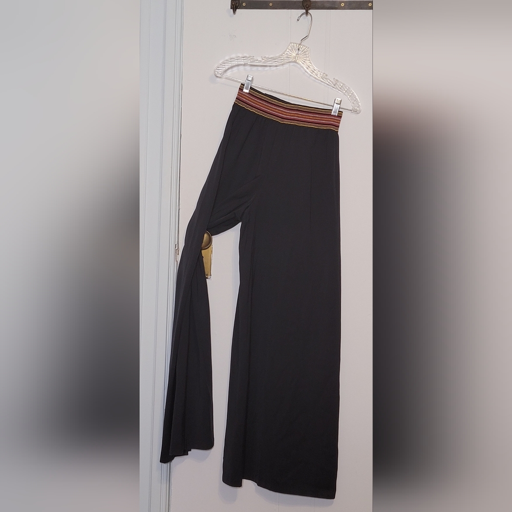 Vintage black wideleg pant with colorful waistband .Waist 28. Hip 36. Length 31.